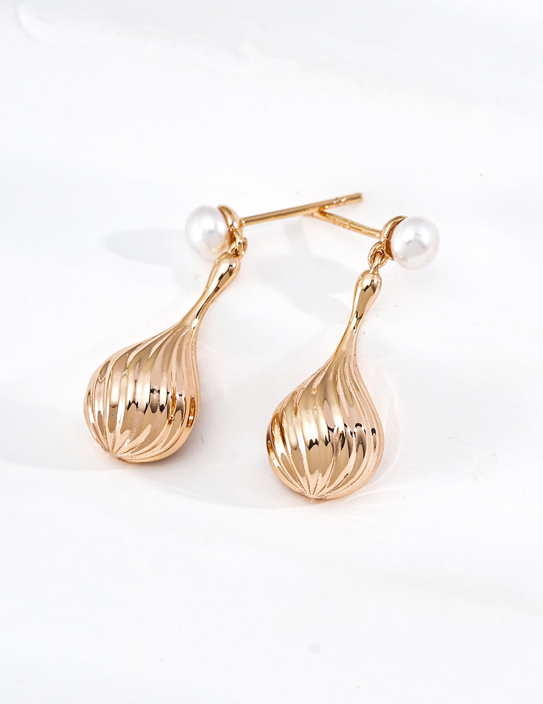 Gilded Teardrop Pearl Earrings image 1
