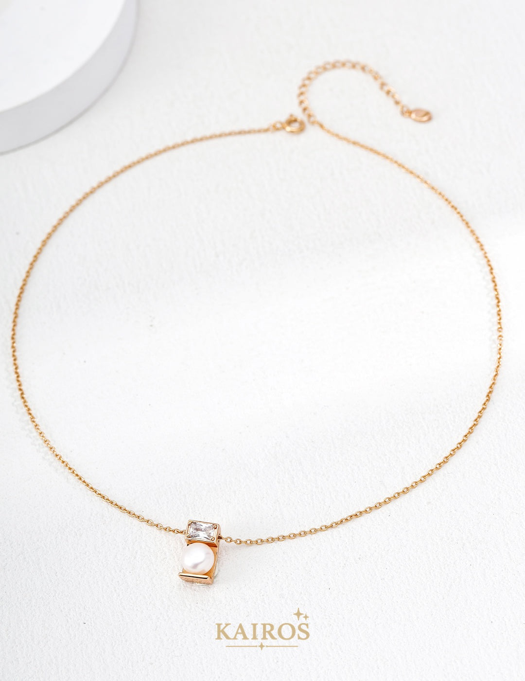 Kairos logo-only cover - Lucky Knot Pearl Necklace