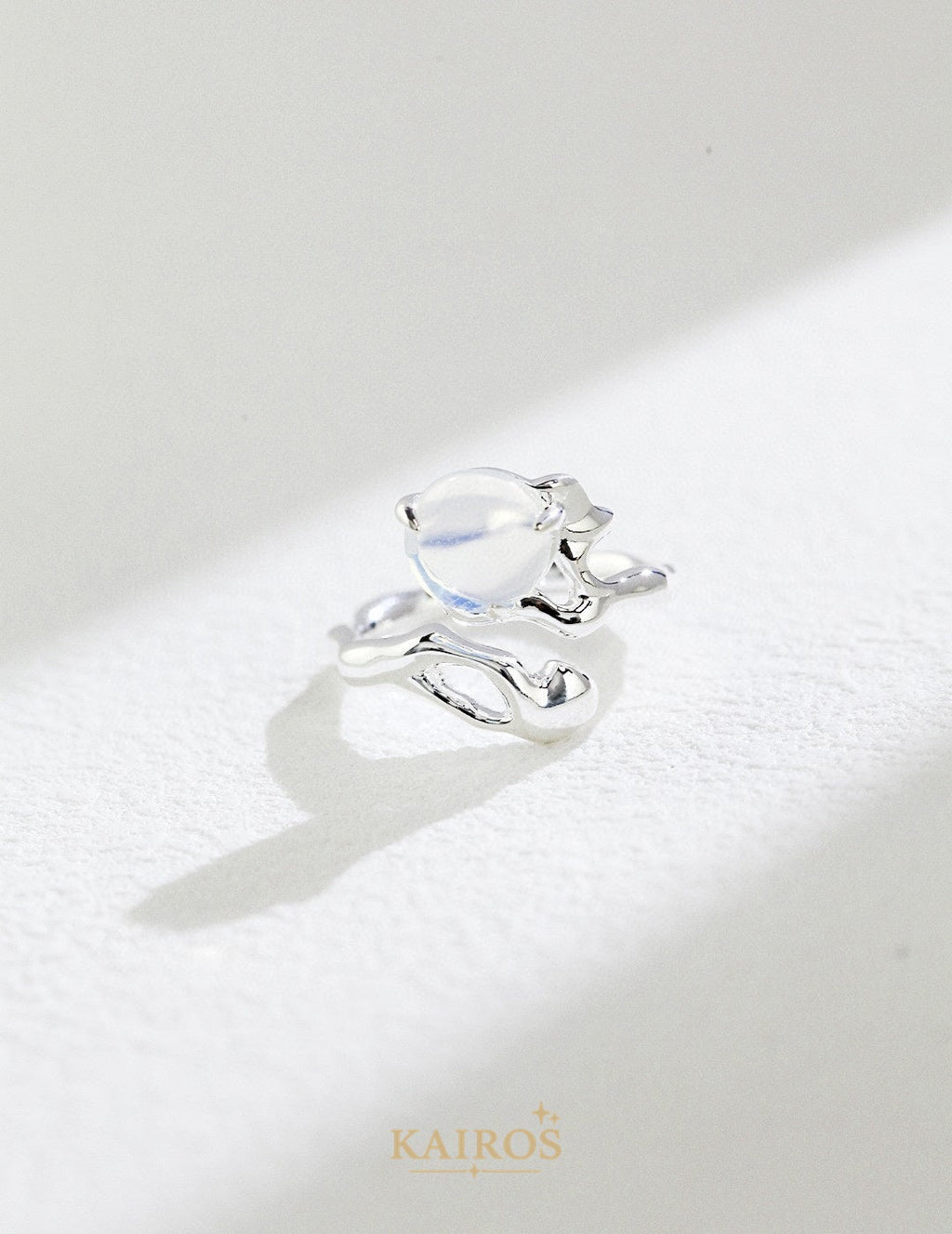 Kairos logo-only cover - Sculpted Flow Grace Ring